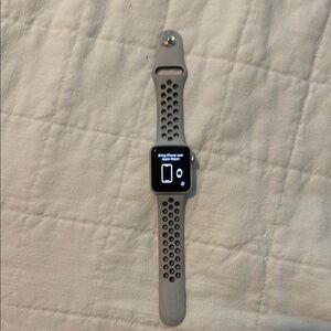 Apple Gray Smartwatch with Sporty Band and Digital Interface